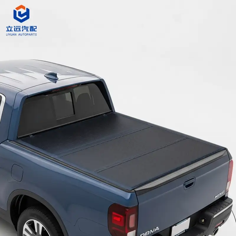 In che modo una copertura rigida ripiegabile a tre strati per cassone può migliorare la protezione del pianale del camion Honda?